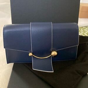 Strathberry navy and white small Crescent bag